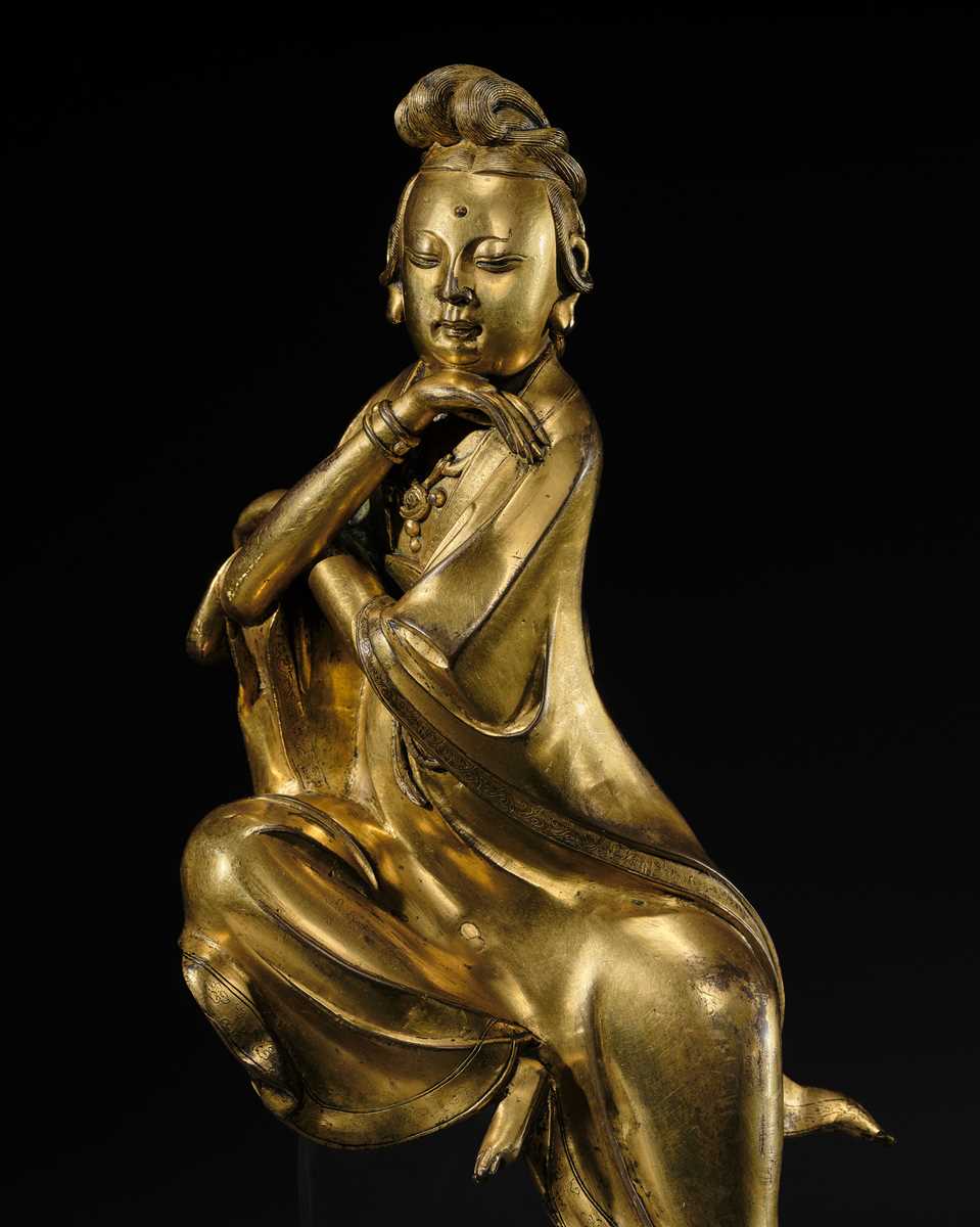 Lot 77 - A MAGNIFICENT AND HIGHLY IMPORTANT GILT-BRONZE FIGURE OF THE WATER MOON GUANYIN, SOUTHERN SONG-EARLY MING DYNASTY