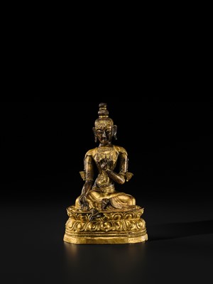 A FINE GILT BRONZE REPOUSSÉ FIGURE OF KHADIRAVANI TARA