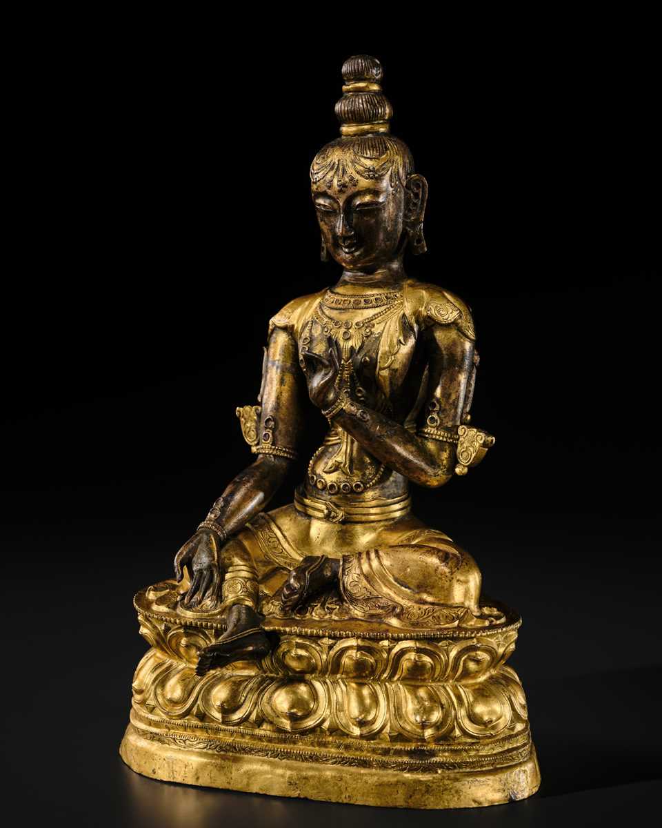A FINE GILT BRONZE REPOUSSÉ FIGURE OF KHADIRAVANI TARA