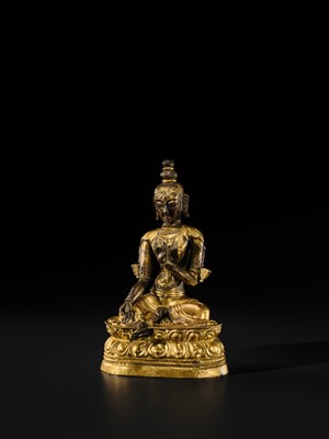 A FINE GILT BRONZE REPOUSSÉ FIGURE OF KHADIRAVANI TARA