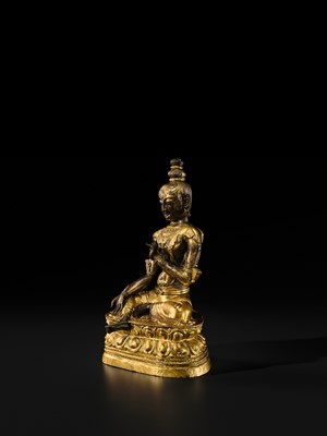 A FINE GILT BRONZE REPOUSSÉ FIGURE OF KHADIRAVANI TARA