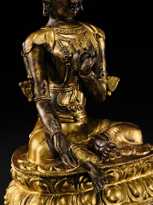 A FINE GILT BRONZE REPOUSSÉ FIGURE OF KHADIRAVANI TARA