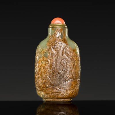 Lot 464 - A GREEN AND RUSSET JADE SNUFF BOTTLE, MASTER OF THE ROCKS SCHOOL, QIANLONG PERIOD