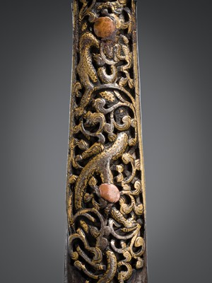 A SHORT SWORD WITH GILT-DAMASCENED IRON MOUNTS, TIBET, CIRCA 16TH-18TH CENTURY