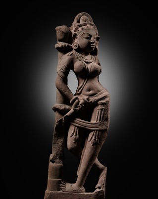 Lot 211 - A PINK SANDSTONE FIGURE OF A CELESTIAL BEAUTY, SURASUNDARI, CENTRAL INDIA, CHANDELA DYNASTY, 10TH-11TH CENTURY