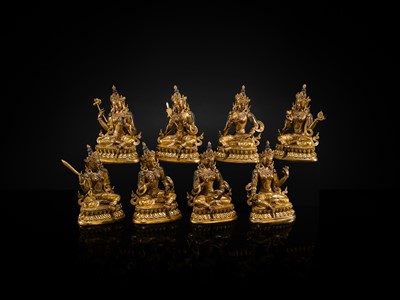A MAGNIFICENT GROUP OF EIGHT CORAL AND TURQUOISE INLAID GILT COPPER FIGURES OF THE EIGHT GREAT BODHISATTVAS, TIBET, 20TH CENTURY