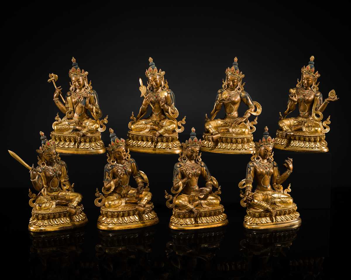A MAGNIFICENT GROUP OF EIGHT CORAL AND TURQUOISE INLAID GILT COPPER FIGURES OF THE EIGHT GREAT BODHISATTVAS, TIBET, 20TH CENTURY