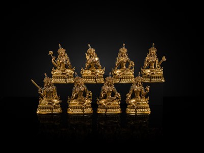 A MAGNIFICENT GROUP OF EIGHT CORAL AND TURQUOISE INLAID GILT COPPER FIGURES OF THE EIGHT GREAT BODHISATTVAS, TIBET, 20TH CENTURY
