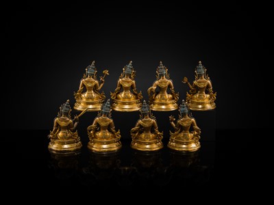 A MAGNIFICENT GROUP OF EIGHT CORAL AND TURQUOISE INLAID GILT COPPER FIGURES OF THE EIGHT GREAT BODHISATTVAS, TIBET, 20TH CENTURY