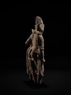 Lot 210 - AN EXTRAORDINARY AND EXTREMELY RARE SANDSTONE FIGURE OF LAKSHMI-NARAYANA, CHANDELA PERIOD, 10TH-12TH CENTURY