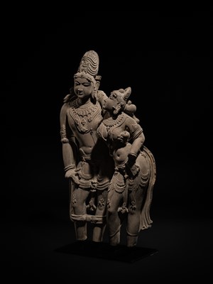 Lot 210 - AN EXTRAORDINARY AND EXTREMELY RARE SANDSTONE FIGURE OF LAKSHMI-NARAYANA, CHANDELA PERIOD, 10TH-12TH CENTURY