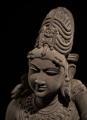 Lot 210 - AN EXTRAORDINARY AND EXTREMELY RARE SANDSTONE FIGURE OF LAKSHMI-NARAYANA, CHANDELA PERIOD, 10TH-12TH CENTURY