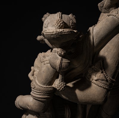Lot 210 - AN EXTRAORDINARY AND EXTREMELY RARE SANDSTONE FIGURE OF LAKSHMI-NARAYANA, CHANDELA PERIOD, 10TH-12TH CENTURY