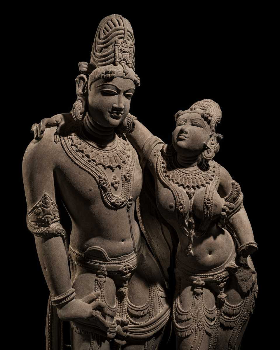 Lot 210 - AN EXTRAORDINARY AND EXTREMELY RARE SANDSTONE FIGURE OF LAKSHMI-NARAYANA, CHANDELA PERIOD, 10TH-12TH CENTURY