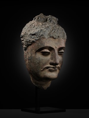 A LARGE GRAY SCHIST HEAD OF BUDDHA SHAKYAMUNI, ANCIENT REGION OF GANDHARA, 1ST-4TH CENTURY