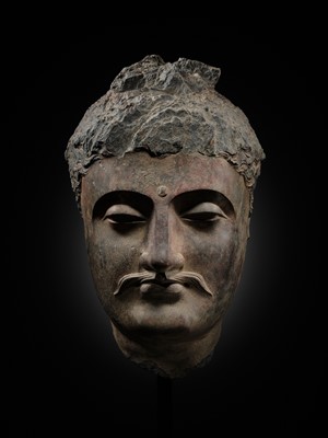A LARGE GRAY SCHIST HEAD OF BUDDHA SHAKYAMUNI, ANCIENT REGION OF GANDHARA, 1ST-4TH CENTURY