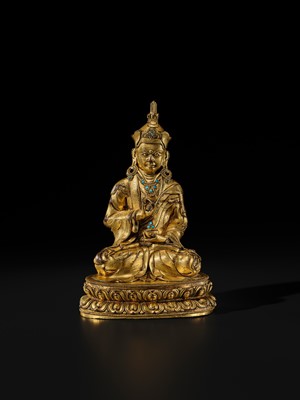 Lot 18 - A GILT BRONZE FIGURE OF PADMASAMBHAVA, TIBET, 16TH-17TH CENTURY
