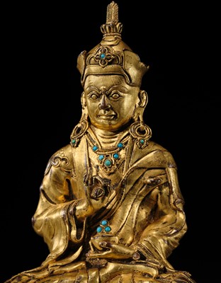 Lot 18 - A GILT BRONZE FIGURE OF PADMASAMBHAVA, TIBET, 16TH-17TH CENTURY