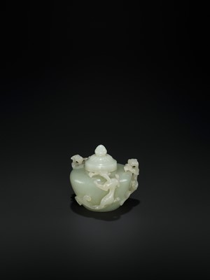 Lot 104 - AN OPENWORK PALE CELADON JADE ‘CHILONG’ WATER POT AND COVER, QING