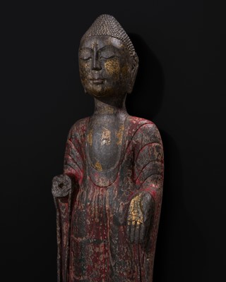 Lot 116 - A RARE AND LARGE LIMESTONE FIGURE OF BUDDHA, NORTHERN QI DYNASTY