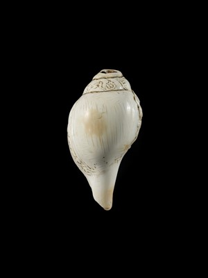 Lot 4 - A RITUAL CONCH SHELL DEPICTING VISHNU AND GARUDA, NEPAL, 11TH CENTURY