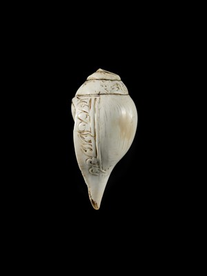 Lot 4 - A RITUAL CONCH SHELL DEPICTING VISHNU AND GARUDA, NEPAL, 11TH CENTURY