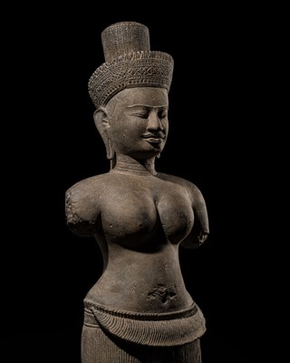Lot 257 - A LARGE SANDSTONE FIGURE OF UMA, ANGKOR PERIOD, BAKHENG STYLE, 10TH CENTURY