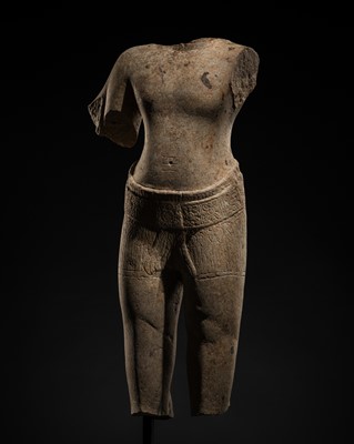 Lot 408 - A BUFF SANDSTONE FIGURE OF A MALE DEITY, ANGKOR PERIOD, BAYON STYLE, 12TH-13TH CENTURY
