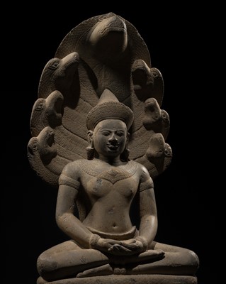 Lot 407 - A SANDSTONE FIGURE OF BUDDHA MUCHALINDA, ANGKOR WAT STYLE, 12TH-13TH CENTURY