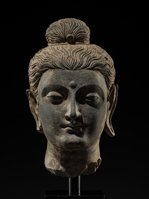 Lot 289 - A GRAY SCHIST HEAD OF BUDDHA, ANCIENT REGION OF GANDHARA, 3RD-4TH CENTURY