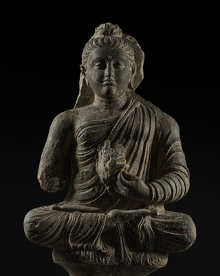 Lot 570 - A GRAY SCHIST FIGURE OF THE TEACHING BUDDHA, GANDHARA, 2ND-3RD CENTURY
