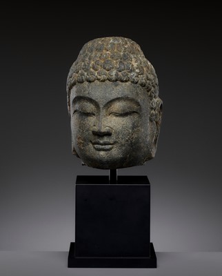 Lot 464 - A DARK GRAY STONE HEAD OF BUDDHA, NORTHERN QI - TANG DYNASTY