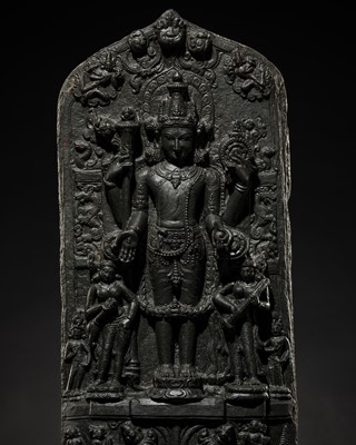 Lot 213 - A CLASSIC BLACK STONE STELE DEPICTING VISHNU, NORTHEASTERN INDIA, PALA PERIOD, 10TH-12TH CENTURY