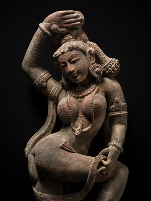 Lot 366 - A FINE GREY SANDSTONE FIGURE OF A DANCING YAKSHI, 18TH TO 19TH CENTURY OR EARLIER