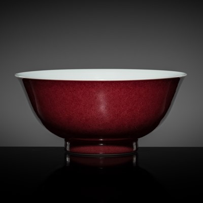 Lot 243 - A LARGE COPPER-RED GLAZED PORCELAIN BOWL, YONGZHENG MARK AND POSSIBLY OF THE PERIOD