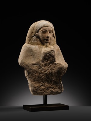 Lot 12 - A RARE EGYPTIAN SANDSTONE FRAGMENT OF A STELOPHOROUS STATUE DEPICTING AN IRY-PAT, NEW KINGDOM, 19TH DYNASTY