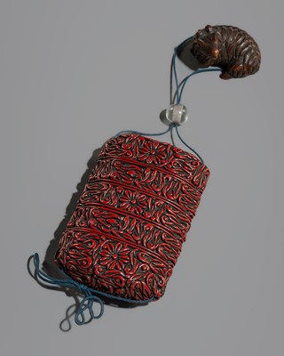 Lot 144 - A FOUR-CASE TSUISHU LACQUER INRO DEPICTING CHRYSANTHEMUM