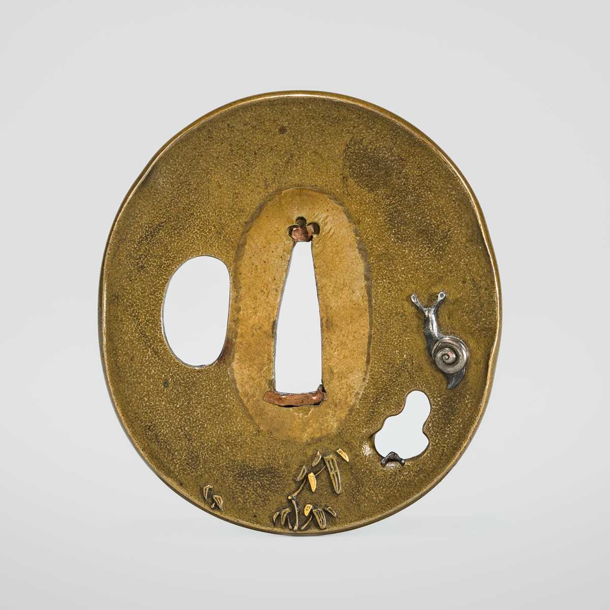 A FINE HAMANO SCHOOL SENTOKU TSUBA DEPICTING SNAILS