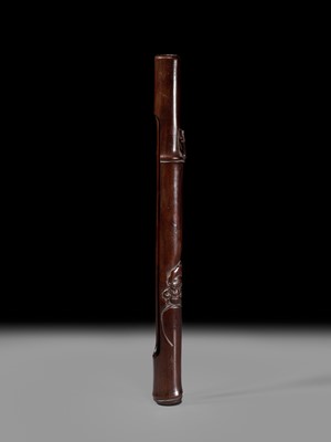 Lot 58 - KOKEI: A RARE AND LARGE WOOD KISERUZUTSU (PIPE CASE) DEPICTING DARUMA