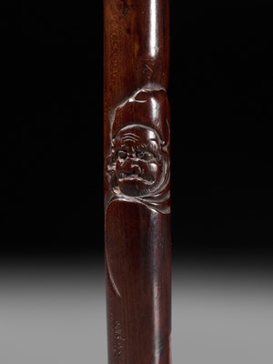 Lot 58 - KOKEI: A RARE AND LARGE WOOD KISERUZUTSU (PIPE CASE) DEPICTING DARUMA