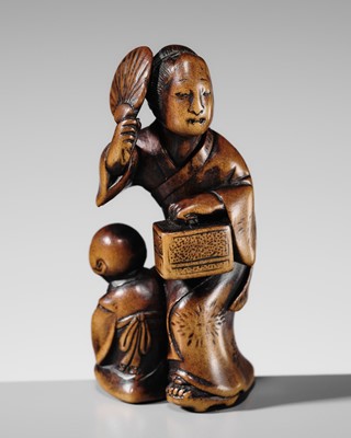 Lot 487 - SHUNKOSAI: A WOOD NETSUKE OF A MOTHER WITH CHILD