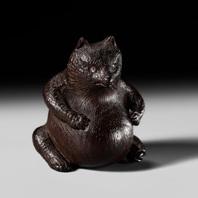 Lot 262 - GYOKUZAN: A VERY FINE TOKYO SCHOOL WOOD NETSUKE OF TANUKI HARA NO TSUZUMI