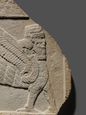 Lot 64 - AN EXTREMELY RARE AND IMPORTANT SANDSTONE RELIEF FRAGMENT DEPICTING A SCORPION-MAN, GIRTABLULLÛ, NEO-BABYLONIAN, 8TH-6TH CENTURY BC