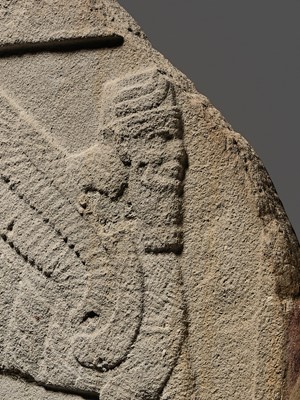 Lot 64 - AN EXTREMELY RARE AND IMPORTANT SANDSTONE RELIEF FRAGMENT DEPICTING A SCORPION-MAN, GIRTABLULLÛ, NEO-BABYLONIAN, 8TH-6TH CENTURY BC