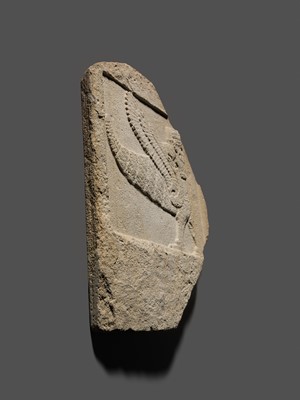Lot 64 - AN EXTREMELY RARE AND IMPORTANT SANDSTONE RELIEF FRAGMENT DEPICTING A SCORPION-MAN, GIRTABLULLÛ, NEO-BABYLONIAN, 8TH-6TH CENTURY BC
