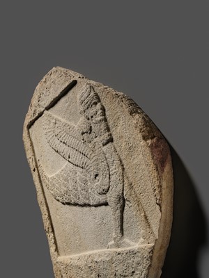 Lot 64 - AN EXTREMELY RARE AND IMPORTANT SANDSTONE RELIEF FRAGMENT DEPICTING A SCORPION-MAN, GIRTABLULLÛ, NEO-BABYLONIAN, 8TH-6TH CENTURY BC