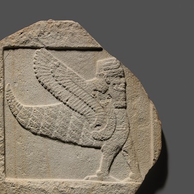 Lot 64 - AN EXTREMELY RARE AND IMPORTANT SANDSTONE RELIEF FRAGMENT DEPICTING A SCORPION-MAN, GIRTABLULLÛ, NEO-BABYLONIAN, 8TH-6TH CENTURY BC