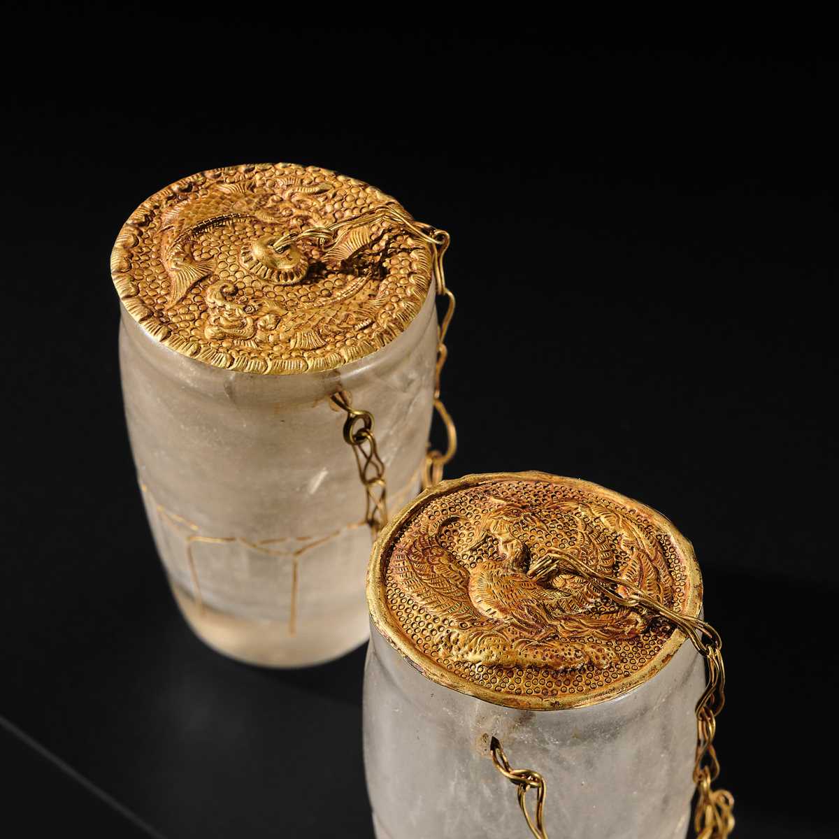 Lot 56 - A PAIR OF FINE ROCK CRYSTAL CUPS WITH FINE GOLD REPOUSSÉ COVERS, LIAO DYNASTY