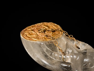 Lot 52 - AN EXTREMELY RARE ROCK CRYSTAL ‘BOVINE HEAD’ RHYTON WITH GOLD COVER, LIAO DYNASTY