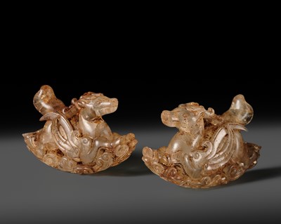 Lot 48 - A PAIR OF ROCK CRYSTAL CARVINGS OF LONGMA, LIAO DYNASTY
